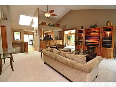 LR with view of sunroom in back ground