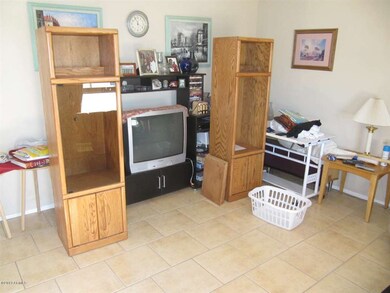 Family room with tile floors