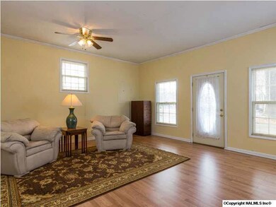 A spacious bonus room has a separate entrance off of the driveway. This versatile room would make a great media room, kids' play area or maybe an exercise room.