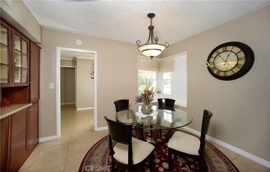 Dining room near kitchen and entry foyer