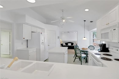 Kitchen view looking towards cozy den
