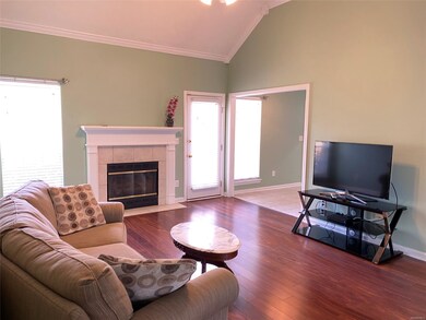 Living area with warm gas fireplace.