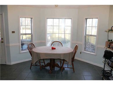 Enjoy the views through the bay window and your di