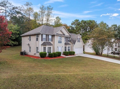 View of front of property featuring a front yard, 