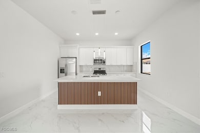 9 NW 14th Place, Cape Coral, FL 33993 - photo 2