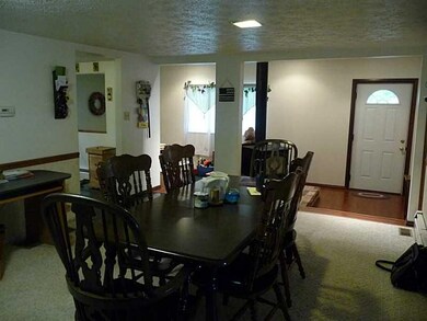 Dining Room. The large dining room is central to t
