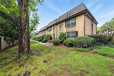View of front of property featuring a front lawn a