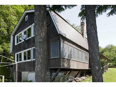 Exterior Front. New metal roof...