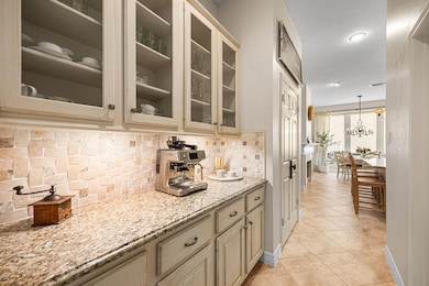 This photo showcases butler's pantry leading to th