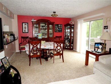 Dining room with sliding doors to the Trex deck ba