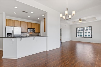 Kitchen featuring appliances with stainless steel 