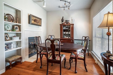 The large window in the dining room brings in outs