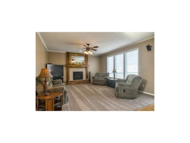 Gas fireplace and new carpet throughout the home a