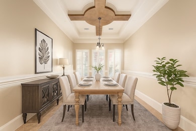 Spacious dining room meant for entertaining! This photo has been digitally staged.