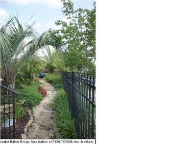 lush landscaping and path around home