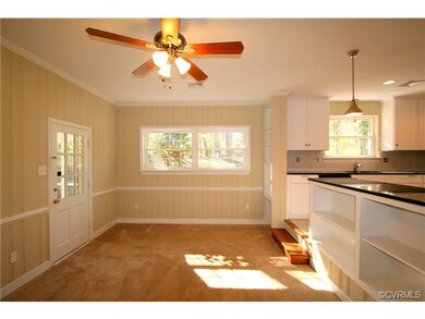 This spacious family room with new carpet and fres