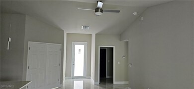 Foyer with ceiling fan