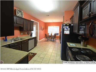 Another view of the kitchen