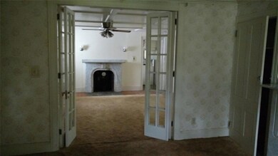 French Doors Between Formal Dining...