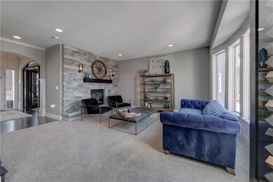 Formal living room with gorgeous floor to ceiling 