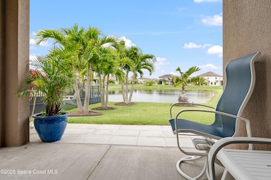 Patio with view of pond
