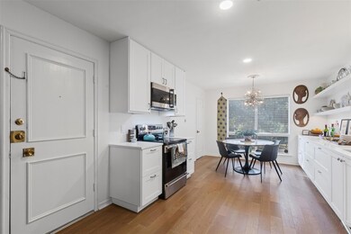 Amazing galley kitchen with new cabinets, new floo