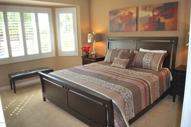Master bedroom w/ bay window