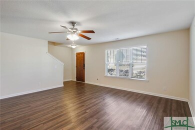 Step inside and notice the easy-care laminate floo