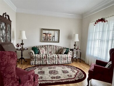 Living room featuring natural light and hardwood f