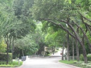 Drive across the bridge into this beautifully kept
