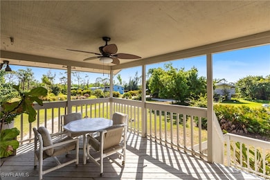Wooden deck featuring ceiling fan