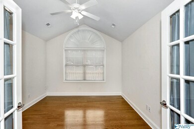 Spacious Study with Cathedral Ceiling, Hardwood Floors and Ceiling Fan.