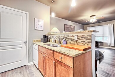Kitchen opens to living space