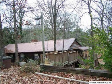 Love that tin roof. New walkway and steps