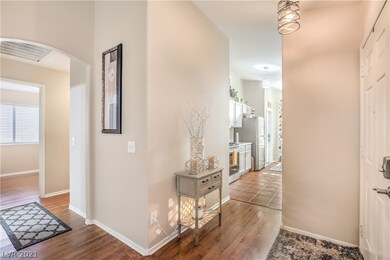 Tall ceilings and archways create an open and invi