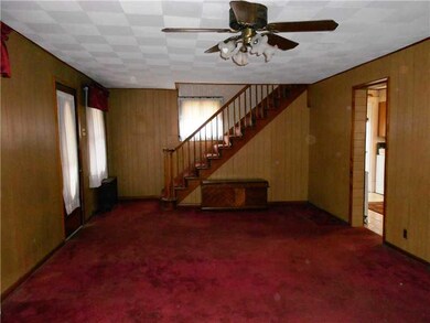 Living Room. The living room opens to both the din