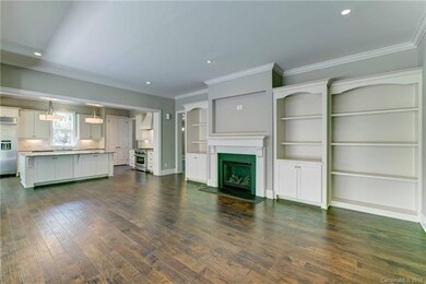 The family room includes stunning built-ins and a 
