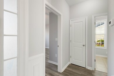 Hall featuring dark hardwood / wood-style floors