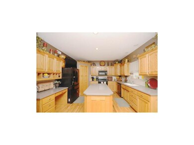 909 Dogwood Dr, Raymore, MO 64083 - photo 7