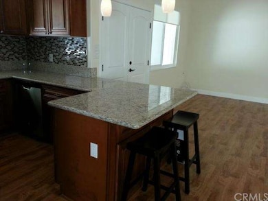 Open kitchen with newer self-closing drawers & cov
