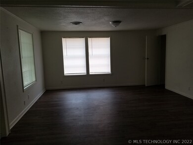 Living room has coat closet
