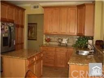 Granite counter tops, maple cabinets, center islan