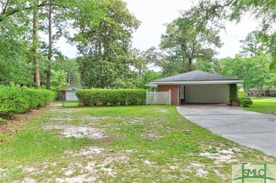 1 Car Garage in Back Yard ~ 2 Car Carport Attached