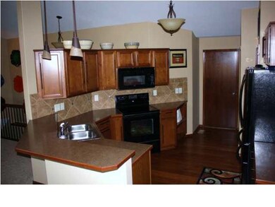 Open Kitchen with walk in pantry and built in disp