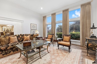 Living room with parquet floors and natural light