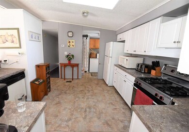 Large kitchen with new counter tops & cabinets!