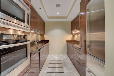 Kitchen with modern cabinets, stainless steel appl
