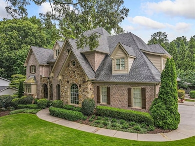 Beautiful, year-round landscaping is enhanced by a 6-zone Rachio controlled irrigation system, ensuring lush, vibrant grounds in every season with efficient, low-maintenance care.