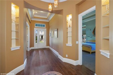 Beautiful Home Entryway w/ Staggered Wood Plank Ti