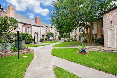 Community pathway leading to the townhome and the